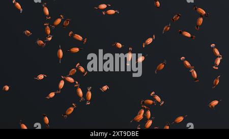 Caramelle di Halloween su sfondo nero 3d. Foto Stock