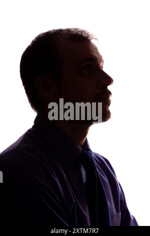 Uomo giovane non rasato uomo d'affari abiti silhouette - su sfondo bianco isolato Foto Stock