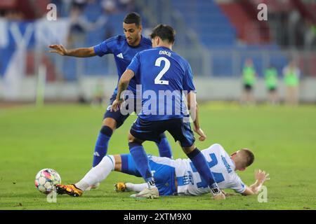 Ostrava, Repubblica Ceca. 15 agosto 2024. L-R Elias Achouri (Copenhagen), Kevin Diks (Copenhagen) e Jan Juroska (Ostrava) in azione durante la UEFA Conference League, terzo turno di qualificazione, ritorno match: FC Banik Ostrava (Czechia) vs FC Copenhagen (Danimarca), a Ostrava, Repubblica Ceca, il 15 agosto 2024 crediti: Petr Sznapka/CTK Photo/Alamy Live News Foto Stock