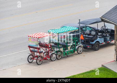 Noleggio di buggy lungo Galveston Seawall Drive Foto Stock