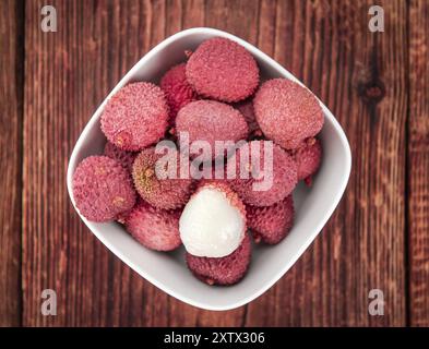 I litchi su un sfondo vintage come dettagliato di close-up shot (messa a fuoco selettiva) Foto Stock