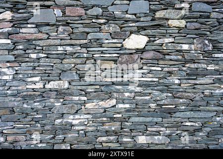 Sfondo di un vecchio muro di ardesia naturale in perfette condizioni Foto Stock