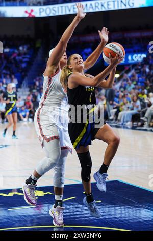 Arlington, Stati Uniti. 16 agosto 2024. La guardia Jacy Sheldon n. 4 dei Dallas Wings arriva al basket durante la partita WNBA contro Connecticut Sun tra i Dallas Wings e il Connecticut Sun al College Park Center. Punteggio finale Dallas Wings 91 - 109 Connecticut Sun. Il 16 agosto 2024 ad Arlington, Texas, Stati Uniti. (Foto di Javier Vicencio/Eyepix Group/Sipa USA) credito: SIPA USA/Alamy Live News Foto Stock