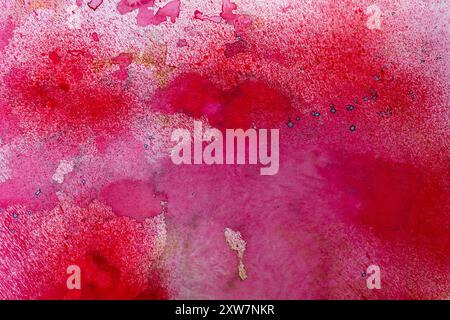 Vivace sfondo ad acquerello rosso e rosa astratto Foto Stock