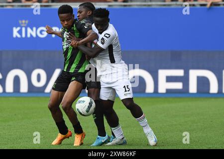 Lovanio, Belgio. 18 agosto 2024. Lawrence Agyekum di Cercle, Flavio Nazinho di Cercle e Ignace Ndri di OHL in azione durante una partita di calcio tra OH Leuven e Cercle Brugge, domenica 18 agosto 2024 a Lovanio, il quarto giorno della stagione 2024-2025 della prima divisione del campionato belga 'Jupiler Pro League'. BELGA FOTO JILL DELSAUX credito: Belga News Agency/Alamy Live News Foto Stock