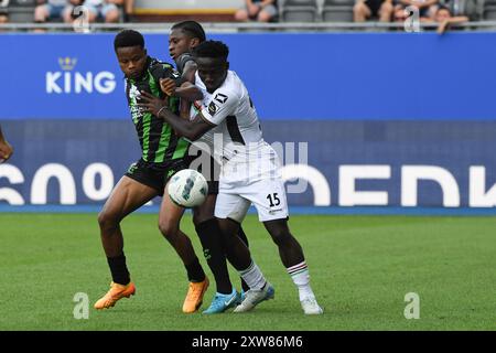 Lovanio, Belgio. 18 agosto 2024. Lawrence Agyekum di Cercle, Flavio Nazinho di Cercle e Ignace Ndri di OHL in azione durante una partita di calcio tra OH Leuven e Cercle Brugge, domenica 18 agosto 2024 a Lovanio, il quarto giorno della stagione 2024-2025 della prima divisione del campionato belga 'Jupiler Pro League'. BELGA FOTO JILL DELSAUX credito: Belga News Agency/Alamy Live News Foto Stock