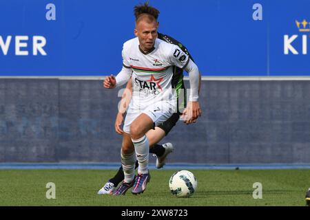 Lovanio, Belgio. 18 agosto 2024. Jon Thorsteinsson dell'OHL raffigurato in azione durante una partita di calcio tra OH Leuven e Cercle Brugge, domenica 18 agosto 2024 a Lovanio, il quarto giorno della stagione 2024-2025 della prima divisione del campionato belga "Jupiler Pro League". BELGA FOTO JILL DELSAUX credito: Belga News Agency/Alamy Live News Foto Stock