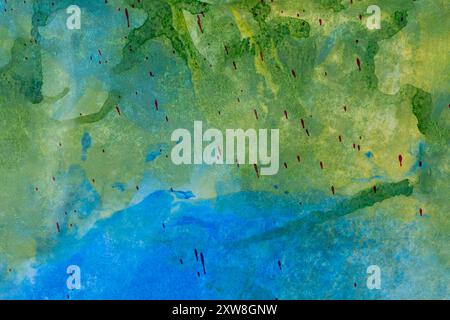 Colorato verde e blu acquerello astratto con spruzzi rossi Foto Stock