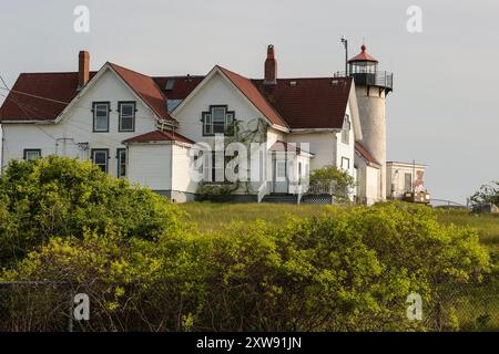Situato a Gloucester, questo splendido e ricco quartiere si trova sul lato orientale di questa città portuale. Il vecchio faro brilla ancora per guidare le barche nella zona Foto Stock