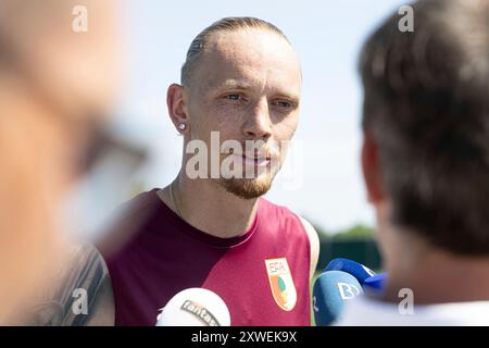 Augusta, Germania. 14 agosto 2024. Marius Wolf (FC Augsburg), Neuzugang, im Interview; FC Augsburg, Training, credito: dpa/Alamy Live News Foto Stock