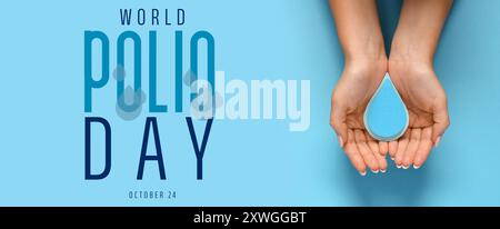 Mani femminili con gocce di carta su sfondo blu. Banner per la giornata Mondiale della polio Foto Stock