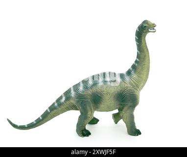 dinosauro giocattolo di plastica isolato su bianco Foto Stock
