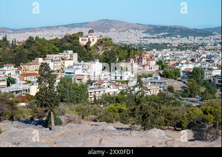 Vista della città di Atene dalla collina Areopago in Grecia. Foto Stock