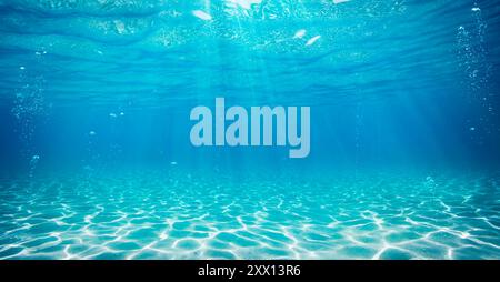 Sott'acqua nel mare azzurro con sabbia - acqua con sole astratto Foto Stock