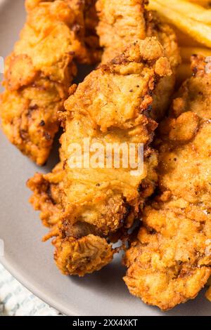 Bistecche fritte dell'Idaho fatte in casa con patatine fritte Foto Stock