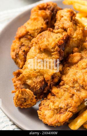 Bistecche fritte dell'Idaho fatte in casa con patatine fritte Foto Stock