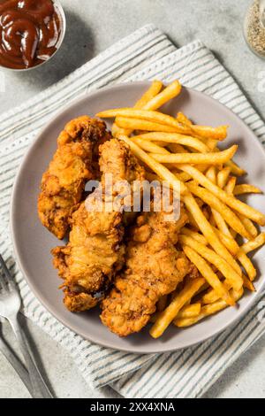 Bistecche fritte dell'Idaho fatte in casa con patatine fritte Foto Stock