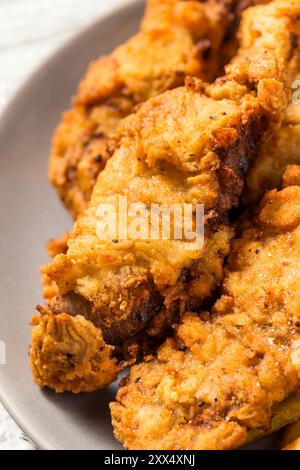 Bistecche fritte dell'Idaho fatte in casa con patatine fritte Foto Stock