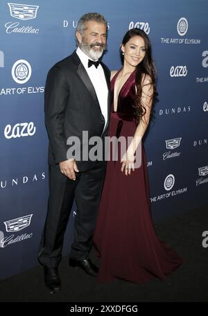 Mel Gibson e Rosalind Ross alla dodicesima celebrazione annuale del Paradiso dell'Art of Elysium tenutasi presso la sede privata di Los Angeles, USA il 5 gennaio 2019 Foto Stock