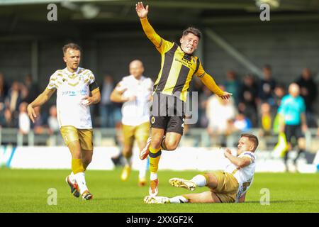 Boston, Regno Unito, 24 agosto 2024, Frankie Maguire del Boston United viene fallottato, durante Boston United vs Tamworth FC, Vanarama National League. Foto Stock