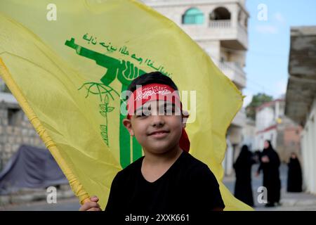 Nullo, nullo, nullo. 25 agosto 2024. 24/08/2024, AITA EL-JABAL, LIBANO: Un giovane ragazzo partecipa ad una cerimonia per onorare un combattente DI HEZBOLLAH ucciso durante il conflitto con ISRAELE. Nel SUD-LIBANO, ragazzi molto giovani partecipano alle attività del partito sciita. (Immagine di credito: © David Allignon/ZUMA Press Wire) SOLO PER USO EDITORIALE! Non per USO commerciale! Foto Stock