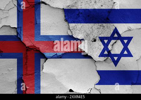 Bandiere delle Isole Faroe e di Israele dipinte su un muro incrinato Foto Stock