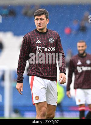 Harry Maguire del Manchester United durante la partita di Premier League tra Brighton e Hove Albion e Manchester United all'American Express Stadium di Brighton, Regno Unito - 24 agosto 2024 foto Simon Dack / Telephoto Images solo uso editoriale. Niente merchandising. Per le immagini di calcio si applicano restrizioni fa e Premier League inc. Non è consentito l'utilizzo di Internet/dispositivi mobili senza licenza FAPL. Per ulteriori dettagli, contattare Football Dataco Foto Stock