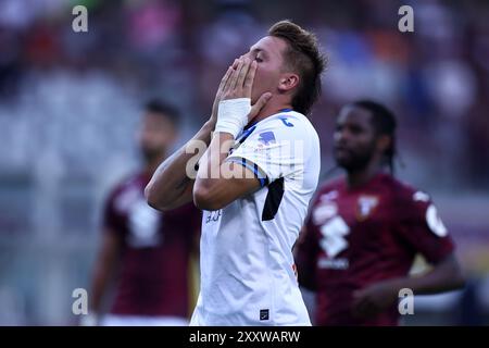 Torino, Italia. 25 agosto 2024. Mateo Retegui dell'Atalanta BC sembra sventato durante la partita di calcio di serie A tra Torino FC e Atalanta BC. Crediti: Marco Canoniero/Alamy Live News Foto Stock