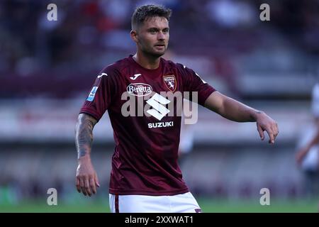 Torino, Italia. 25 agosto 2024. Karol Linetty del Torino FC gesti durante la partita di serie A tra Torino FC e Atalanta BC. Crediti: Marco Canoniero/Alamy Live News Foto Stock