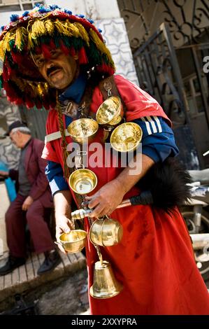 A traditional water seller in Morocco. Stock Photo