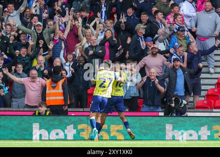 L'attaccante del West Bromwich Albion Karlan Grant (18) segna un GOL di 0-1 e festeggia durante la partita del campionato EFL tra Stoke City FC e West Bromwich Albion FC al Bet365 Stadium, Stoke-on-Trent, Inghilterra, Regno Unito il 24 agosto 2024 Credit: Every Second Media/Alamy Live News Foto Stock