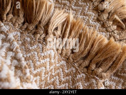 Carta da parati per prodotti tessili. Spazio per la copia. Sfondo decorativo di tessuto rustico in tonalità beige . Foto orizzontale di alta qualità Foto Stock