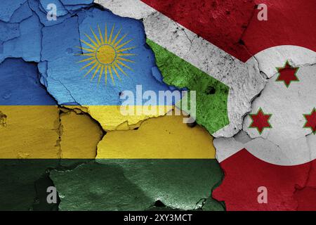 Bandiere del Ruanda e del Burundi dipinte su un muro incrinato Foto Stock