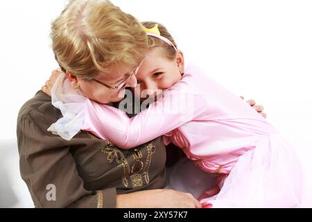 Una bambina carina felice con la nonna Foto Stock