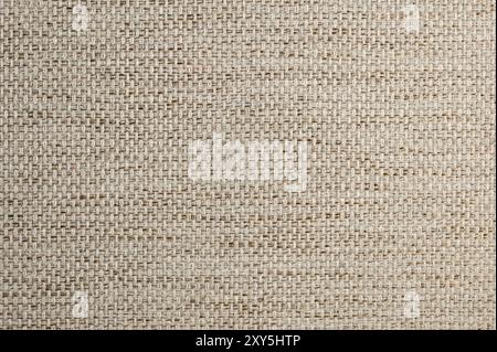 Fondo testurizzato grande tessuto beige. Primo piano della consistenza del tessuto Foto Stock