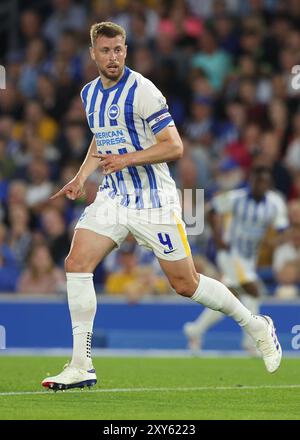 Brighton e Hove, Regno Unito. 27 agosto 2024. Adam Webster di Brighton durante la partita della Carabao Cup all'AMEX Stadium di Brighton e Hove. Il credito per immagini dovrebbe essere: Paul Terry/Sportimage Credit: Sportimage Ltd/Alamy Live News Foto Stock