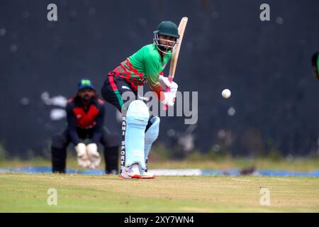 NAIROBI, KENYA - AGOSTO 28: Kenya - batter, Pushkar Sharma in azione durante una sezione di addestramento in preparazione del Consiglio internazionale di cricket (ICC) Foto Stock