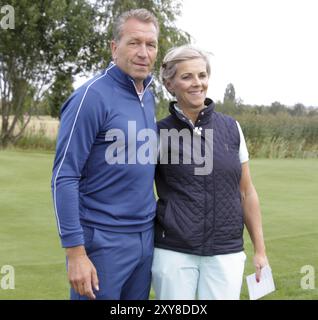 L'ex portiere Andreas Koepke e la sua donna Birgit al 7° GRK Golf Charity Masters 2014 di Lipsia Foto Stock