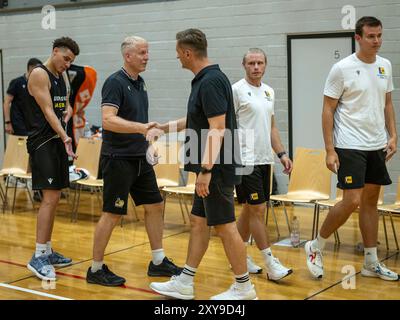 Ludwigsburg, Germania. 28 agosto 2024. John Patrick (MHP Riesen Ludwigsburg, Head-Coach), Igor Perovic, GER, MHP Riesen Ludwigsburg vs. Kirchheim Knights, Basketball, Testspiel, Spielzeit 2024/2025, 28.08.2024, foto: Eibner-Pressefoto/Sascha Walther credito: dpa/Alamy Live News Foto Stock