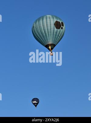 Due mongolfiere al Northampton Balloon Festival. Foto Stock