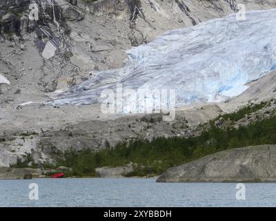 Da Wikipedia: Nigardsbreen è un braccio glaciale del grande ghiacciaio Jostedalsbreen. Nigardsbreen si trova a circa 30 chilometri a nord del villaggio Foto Stock