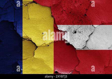 Bandiere della Romania e dell'Austria dipinte su un muro incrinato Foto Stock