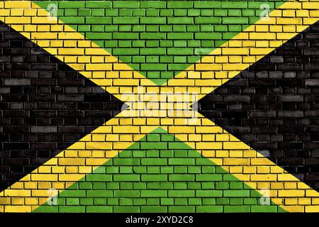 Bandiera della Giamaica dipinta su un muro di mattoni Foto Stock