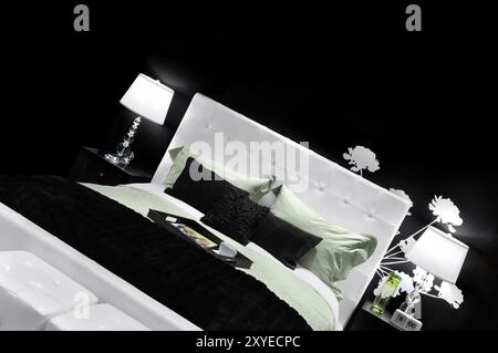 Elegante design interno della camera da letto in colori nero bianco e verde Foto Stock