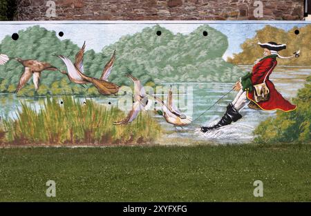 Dipinto di Muenchhausen su un muro di una casa a Bodenwerder Foto Stock