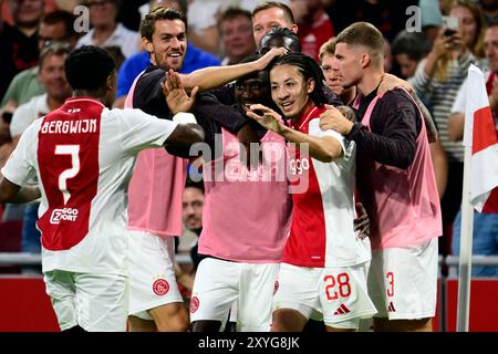 AMSTERDAM - (l-r) Steven Bergwijn dell'Ajax, Carlos Borges Forbes dell'Ajax, Kian Fitz-Jim dell'Ajax, Anton Gaaei dell'Ajax celebrano il 1-0 durante il match di UEFA Europa League tra Ajax e Jagiellonia Bialystok alla Johan Cruijff Arena il 29 agosto 2024 ad Amsterdam. ANP OLAF KRAAK Foto Stock