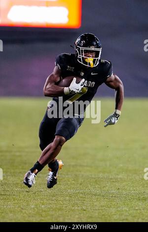 29 agosto 2024: Il running back dei Colorado Buffaloes Dallan Hayden (7) corre dopo la cattura nella seconda metà della partita di football tra Colorado e North Dakota State a Boulder, CO. Derek Regensburger/CSM. Foto Stock