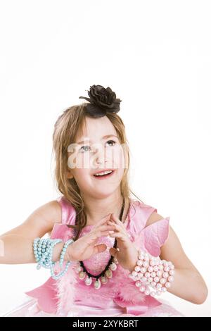 La bambina suona principessa o ballerina in un costume rosa Foto Stock