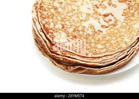 Qualche pancake su fondo bianco Foto Stock