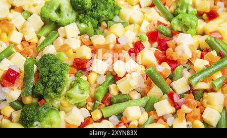 Un cocktail di congelati verdure tritate close-up come sfondo Foto Stock